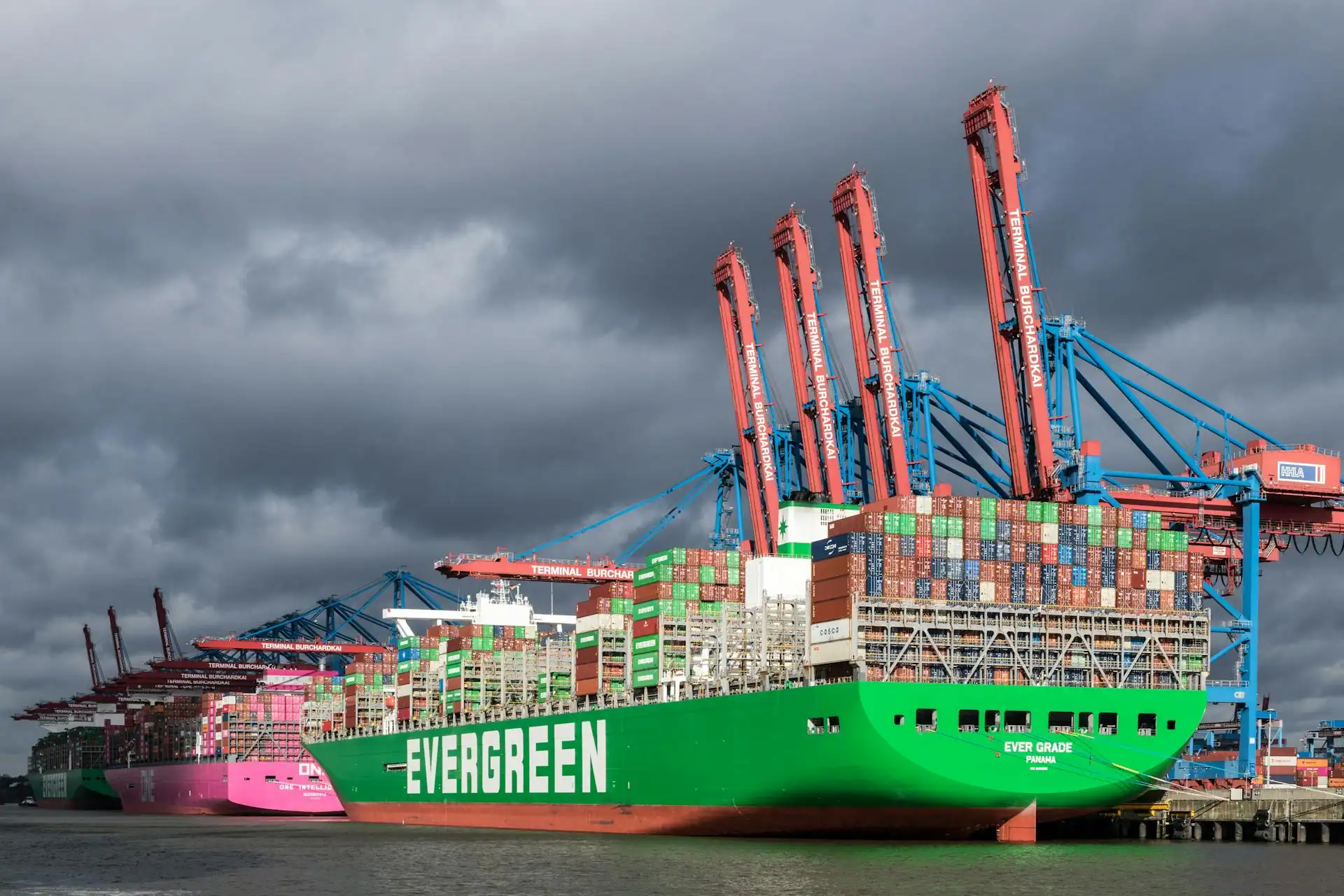 Container ships with cargo at China Vast Logistics port, showcasing international shipping and freight forwarding services in Shanghai.