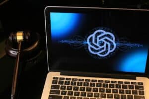 Gavel and laptop with digital logo, legal and logistics technology, China Vast Logistics, legal court symbol, digital logistics solutions, legal technology in China, innovative logistics and legal services relevance.