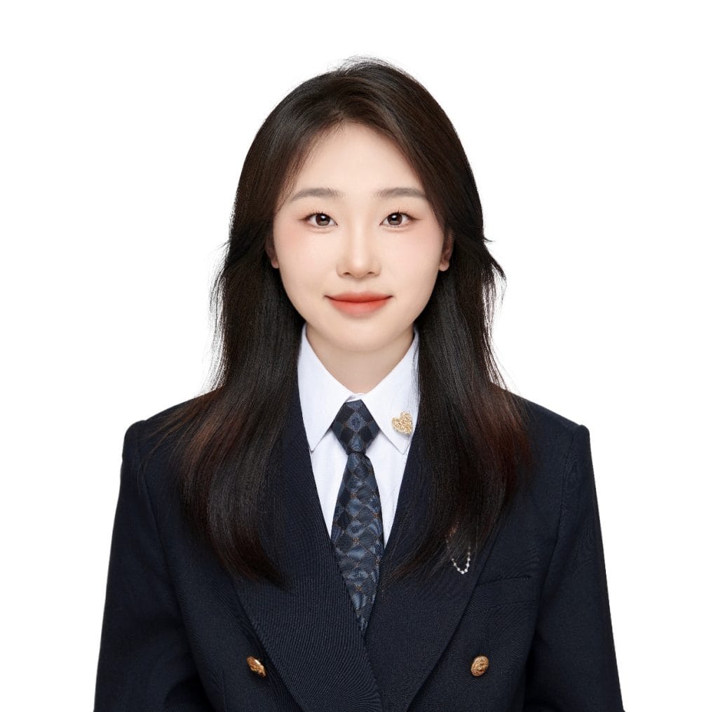 Professional headshot of Sofia, sales representative at Vastlog, wearing a beige blazer and pearl earrings, posed against a plain background