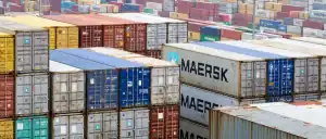 Shipping containers stacked at China Vast Logistics port for international freight and cargo solutions.