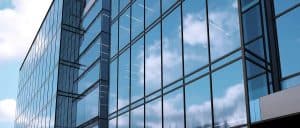 Vast Logistics China modern glass office building with reflective windows showcasing urban commercial infrastructure.