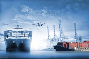Large cargo ships docked at a busy port with cranes and containers, showcasing China Vast Logistics' global shipping, freight forwarding, and supply chain management solutions.